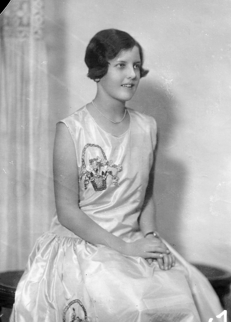 old fashion po of woman wearing a dress