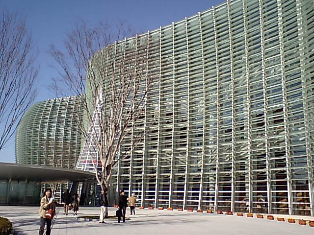 the building is made up of several rows of glass windows