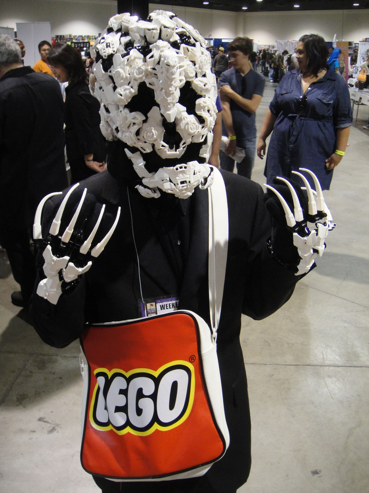 a man wearing a lego bag and headpiece