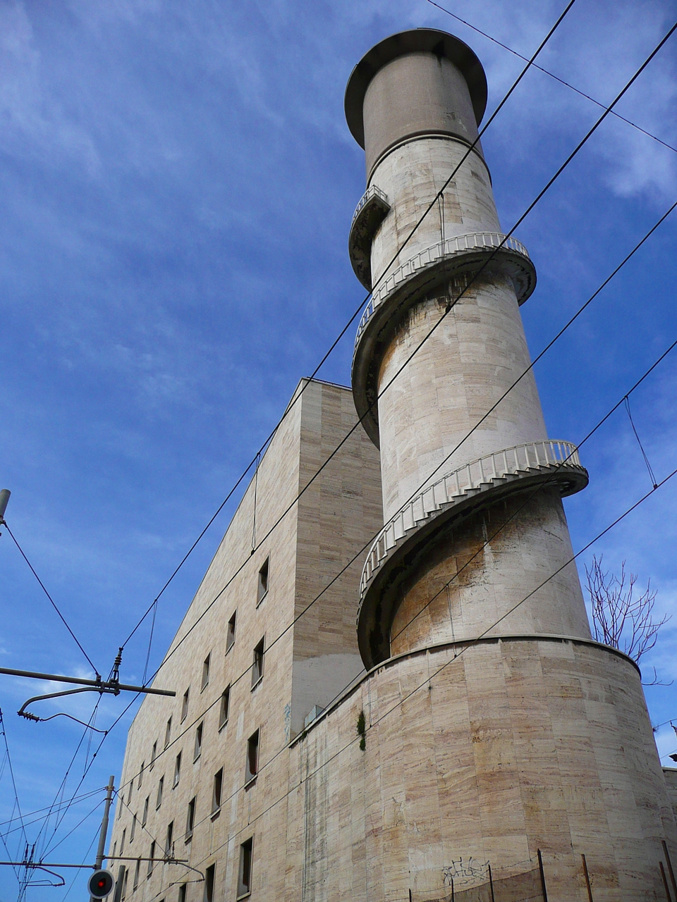 an old gray and stone building with the sky in the background