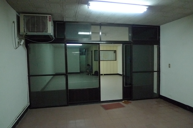 empty room with sliding glass doors, air conditioner and air conditioning