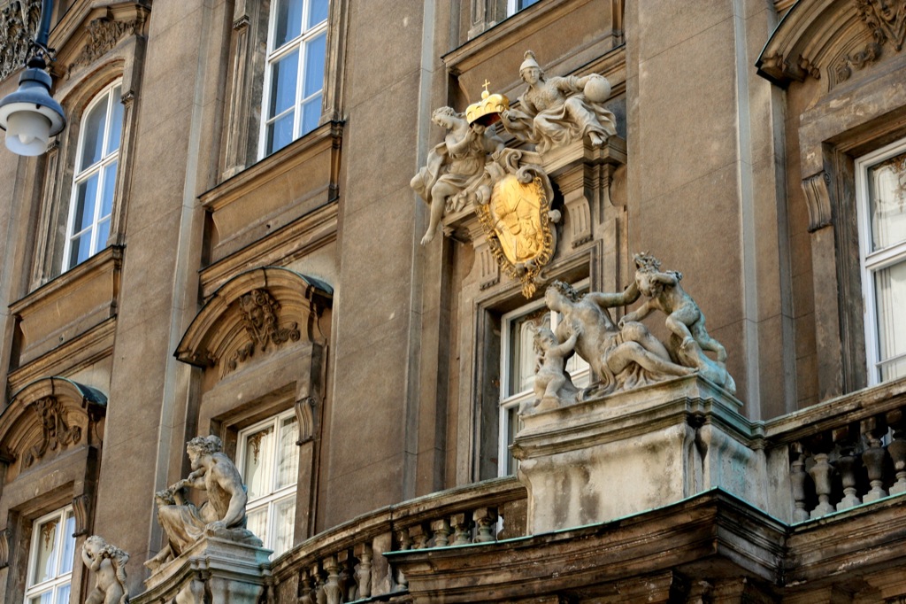 this ornate balcony is located next to the building