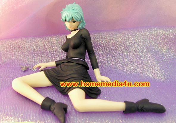 a toy woman laying down on the floor