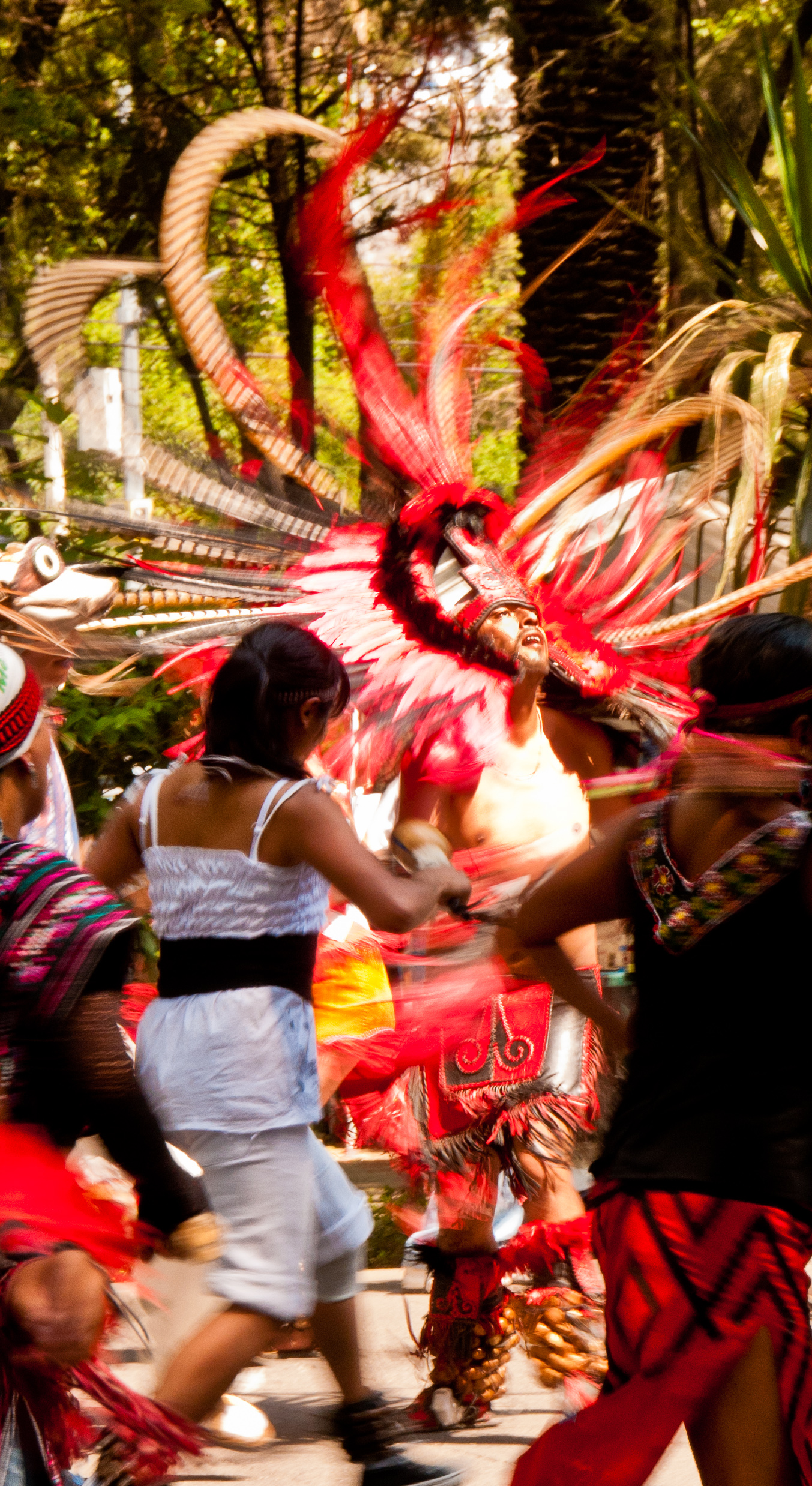 a large group of people with colorful costumes