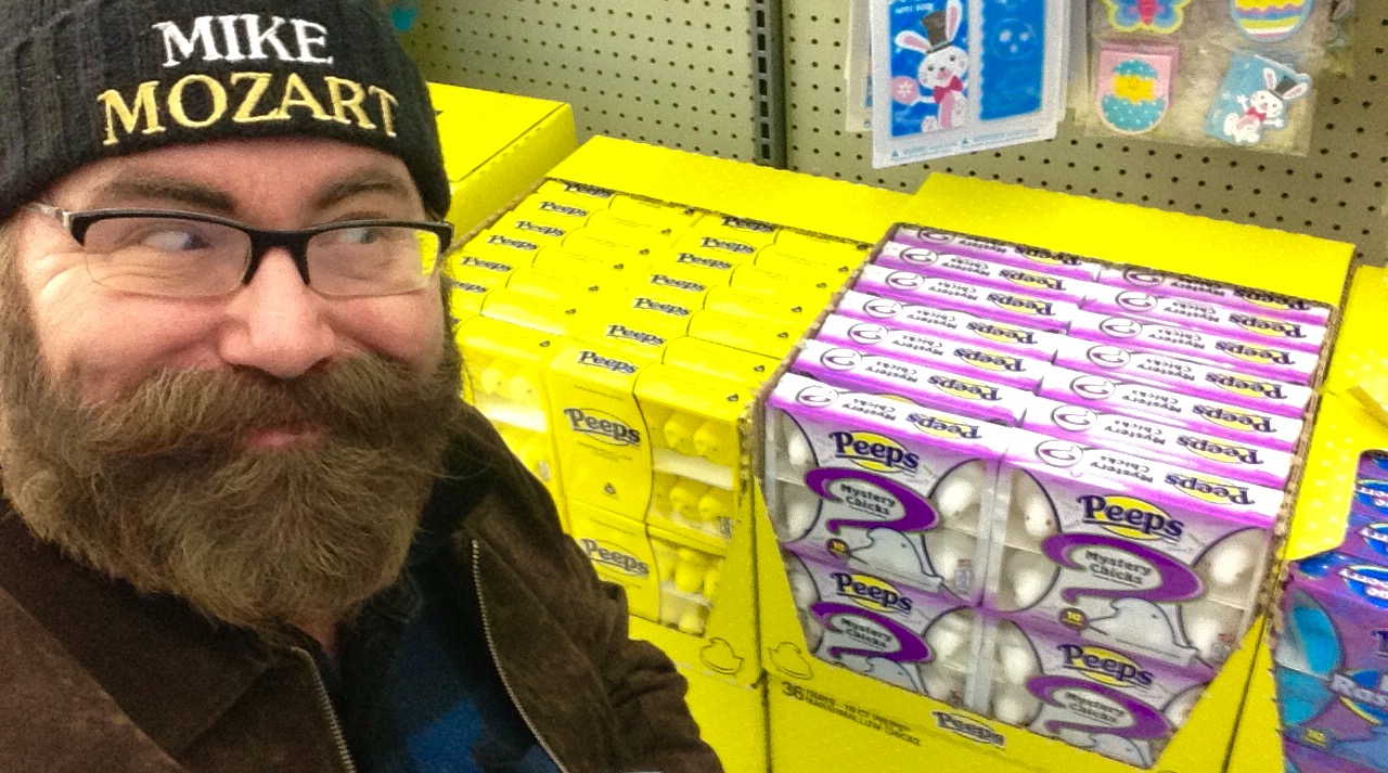 a man wearing a winter hat is surrounded by packages of milk
