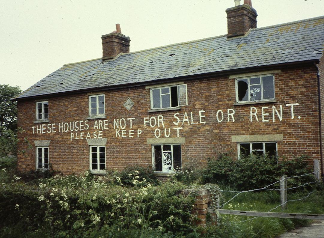 an old building with writing on it