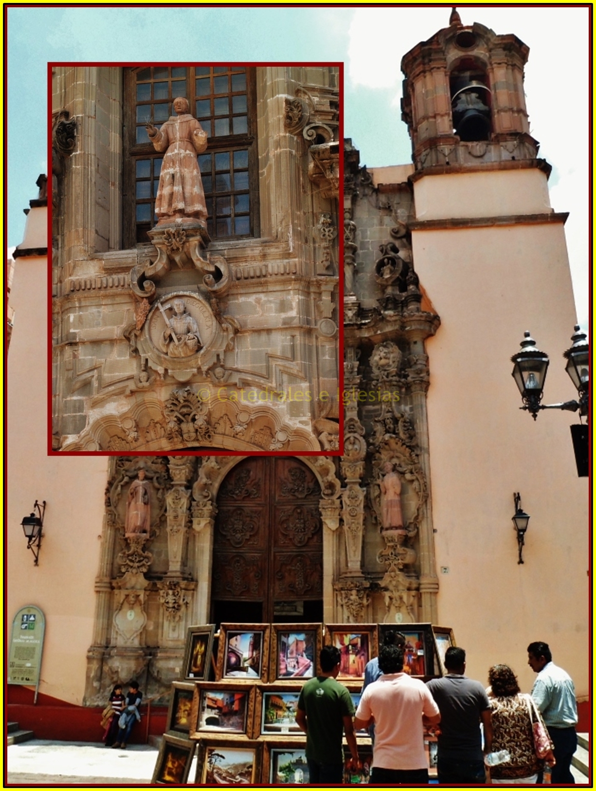 an old building has a big picture with people