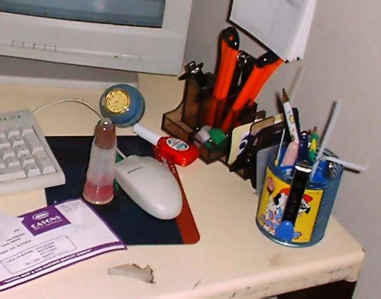 an open laptop sitting on top of a desk