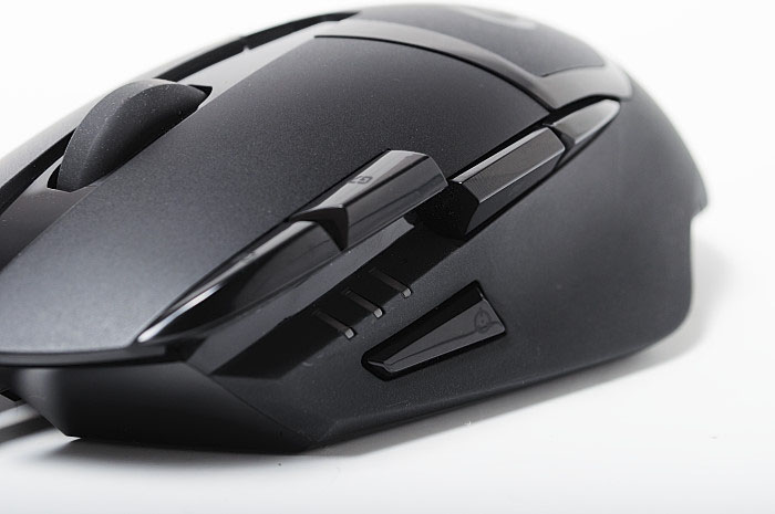 a black computer mouse with ons on the side