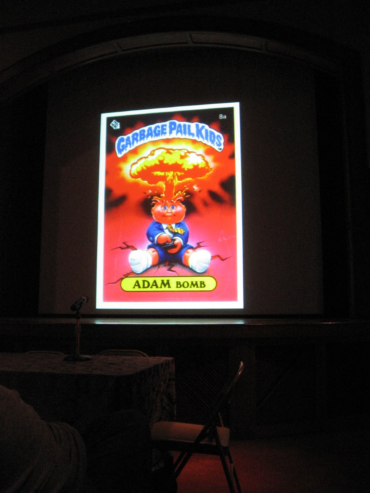 a large video game being projected on an illuminated screen