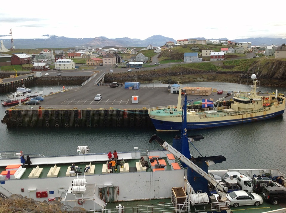 an ocean port with some boats docked