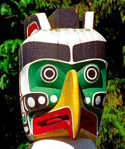 a totem is in front of some trees