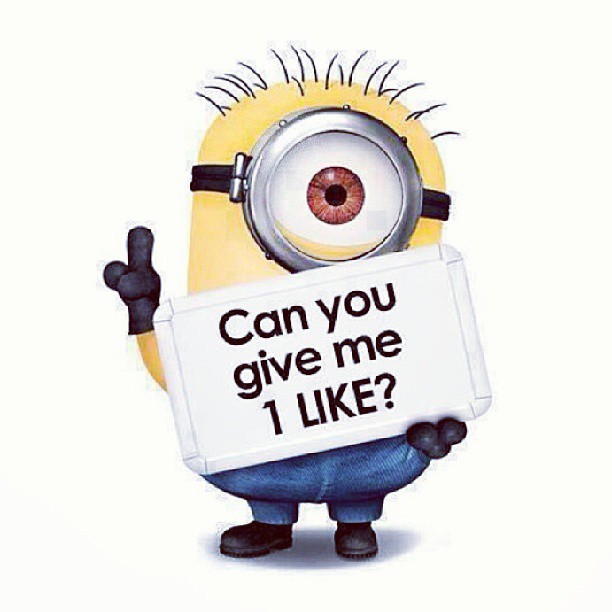 a minion holding a sign that reads can you give me i like?