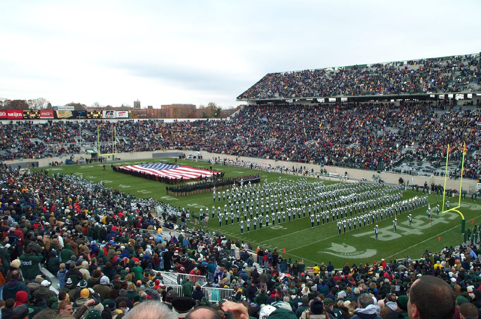 the marching team is performing at the football game