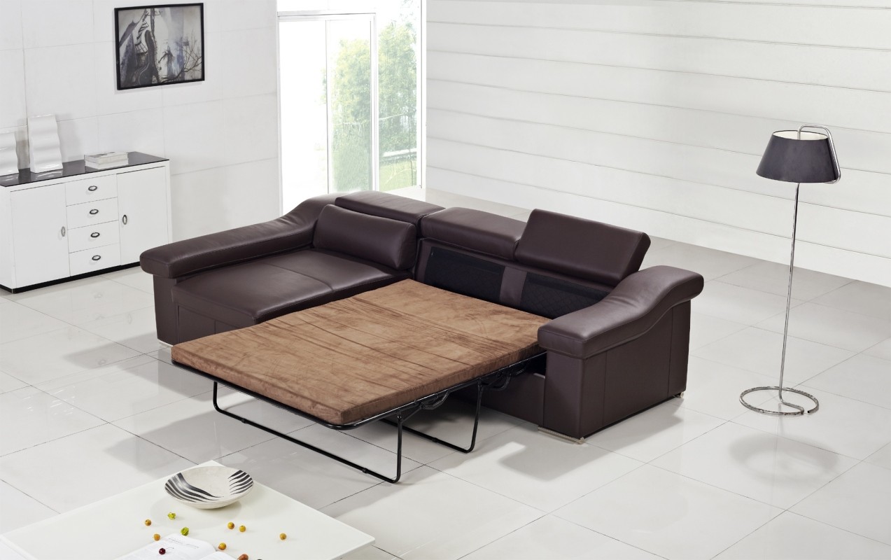 a couch is shown with a table on it