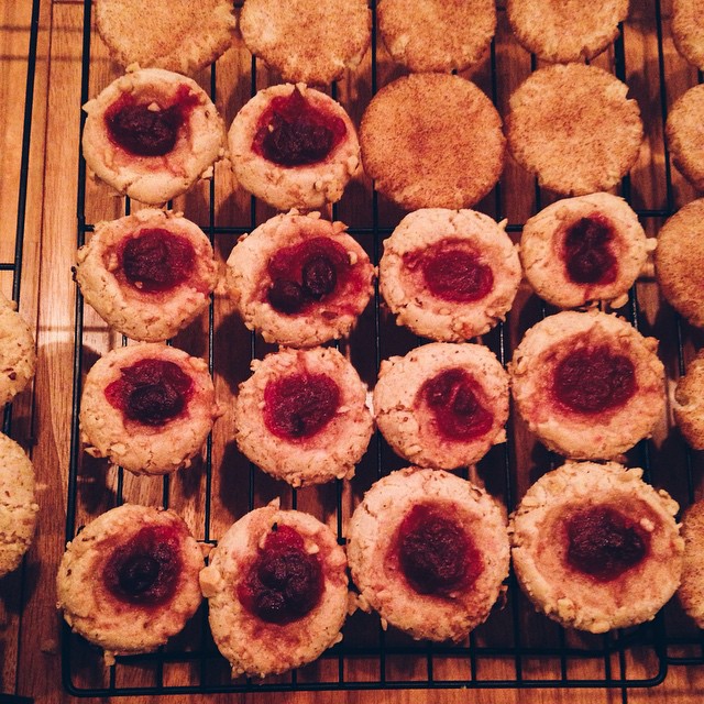 a number of small pastries on a cooling rack