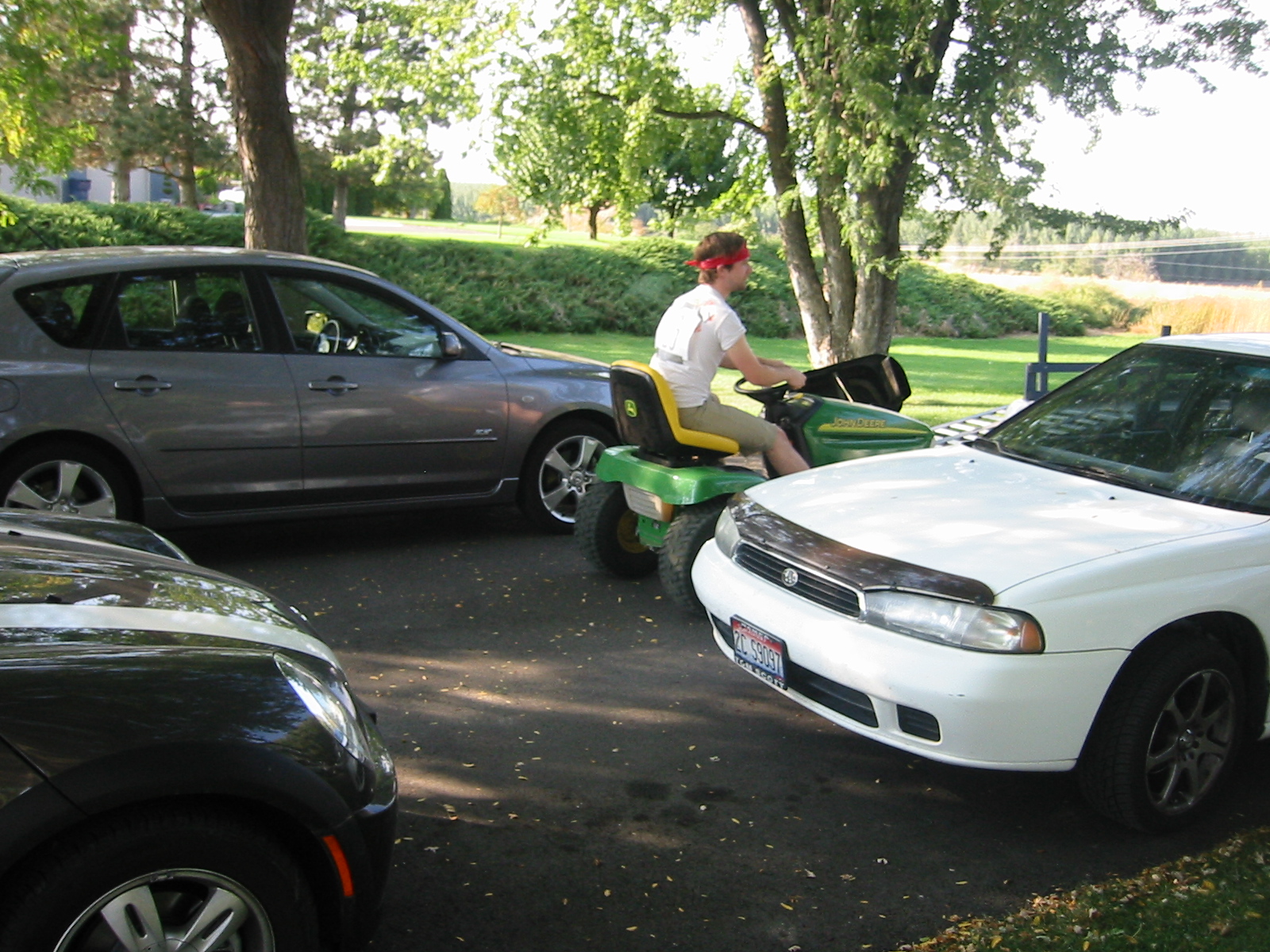 a person is sitting on a three wheeled vehicle