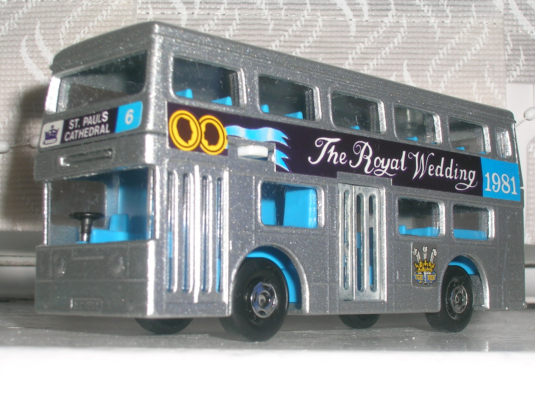 a model london bus that is part of the royal wedding bus