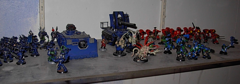 a warhammering game on a table with many toy figures