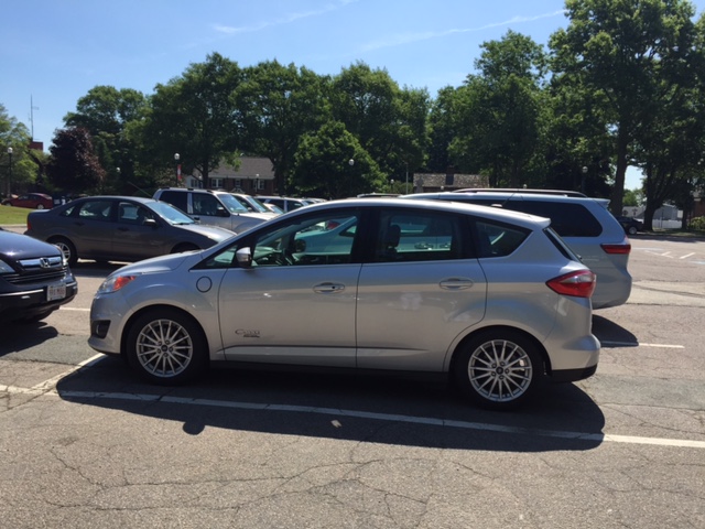 a silver ford galaxy parked in a parking lot