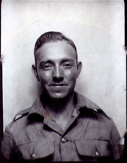 an old black and white po of a man wearing military clothing