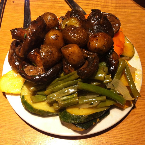 meat and vegetables are served on a plate