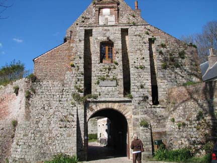 the entrance to a stone building is shown