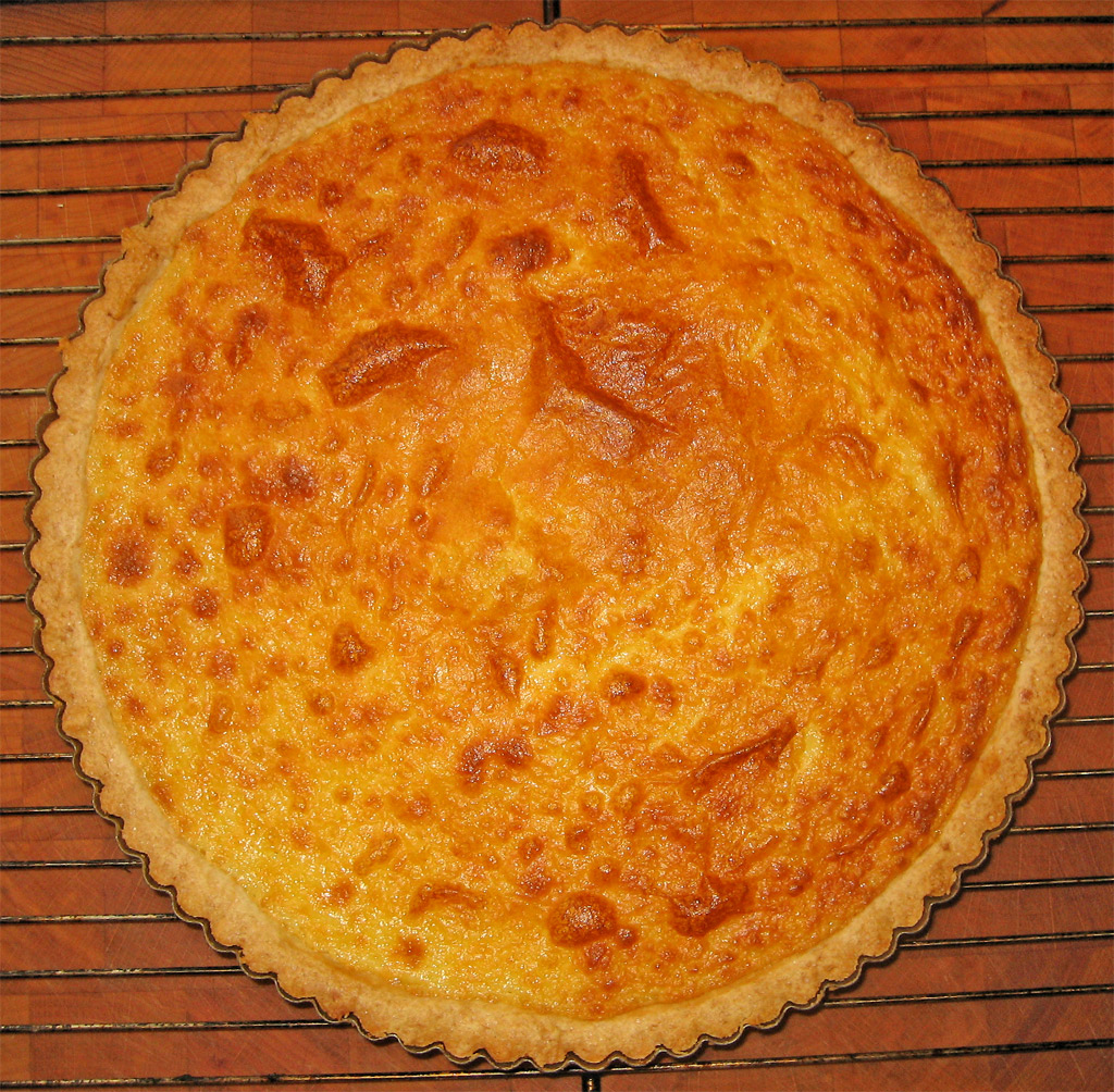 the freshly baked bread pie is on a rack