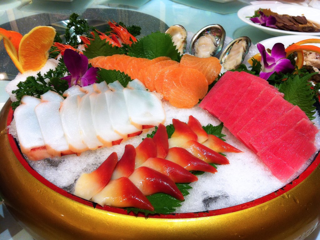 a colorful sushi platter is on display