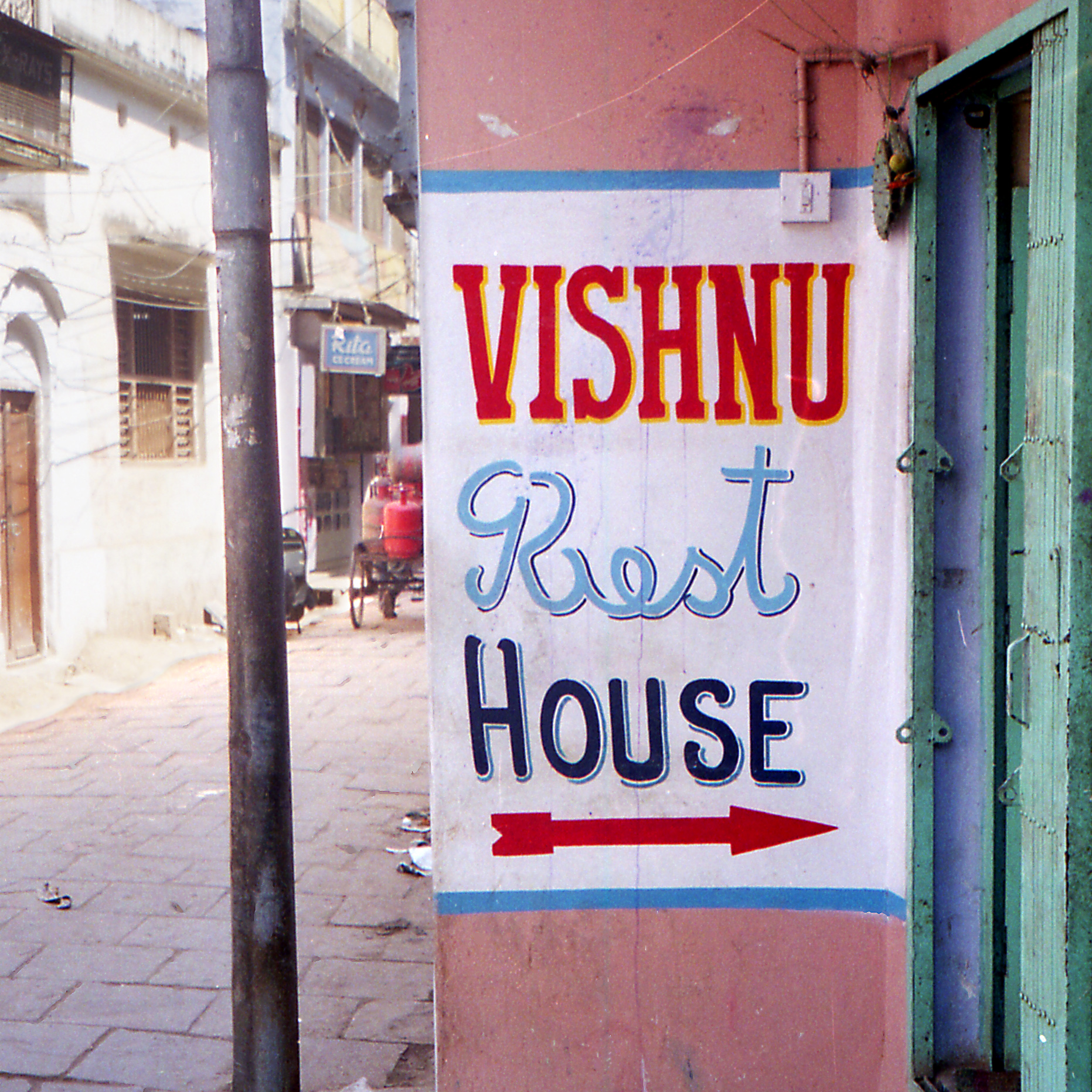 a sign with words is displayed outside a house