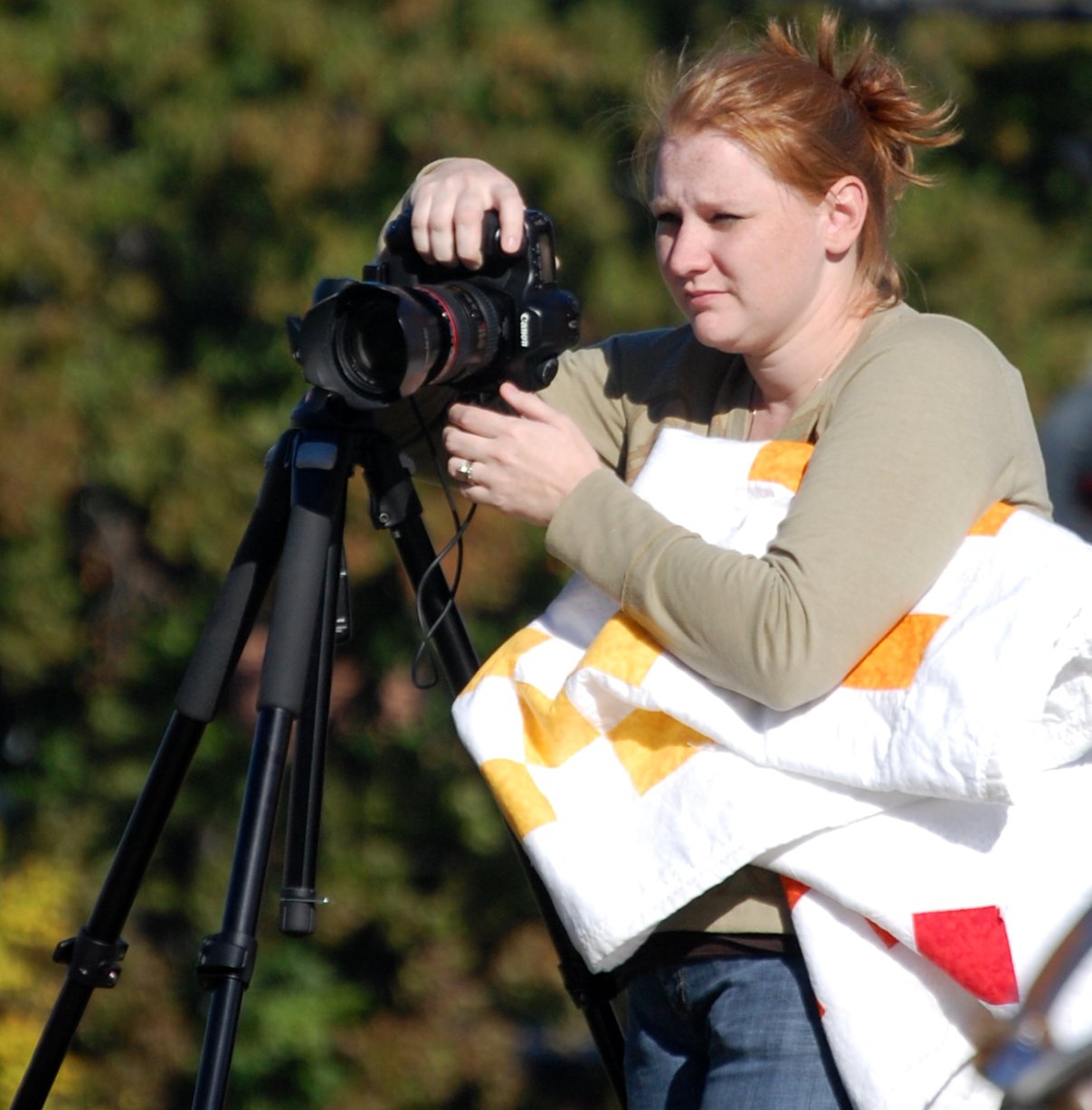 a woman taking a po of another person with a camera