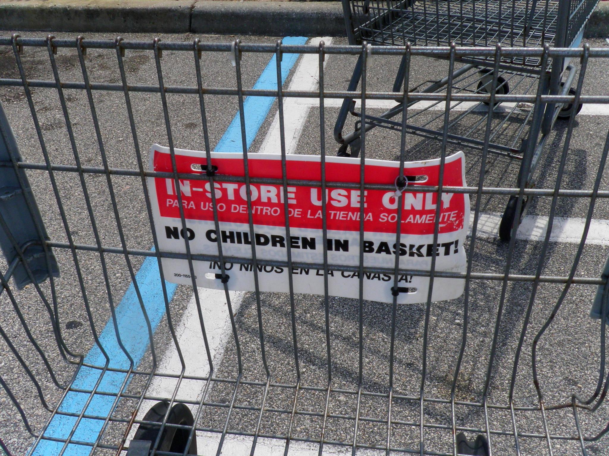 a close up of two empty shopping carts