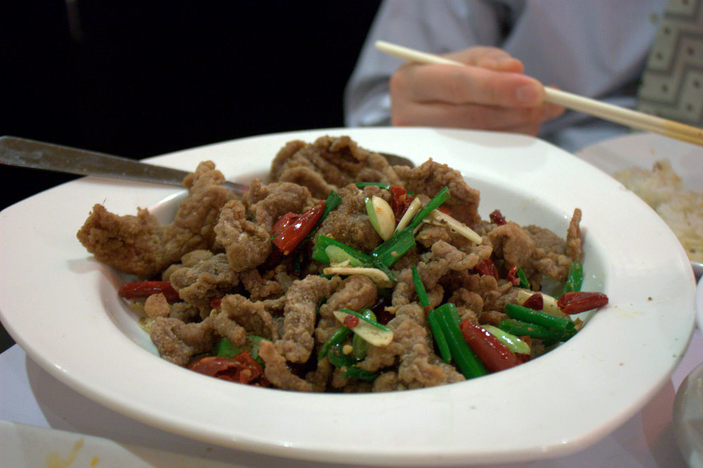 some kind of food that is on a white plate