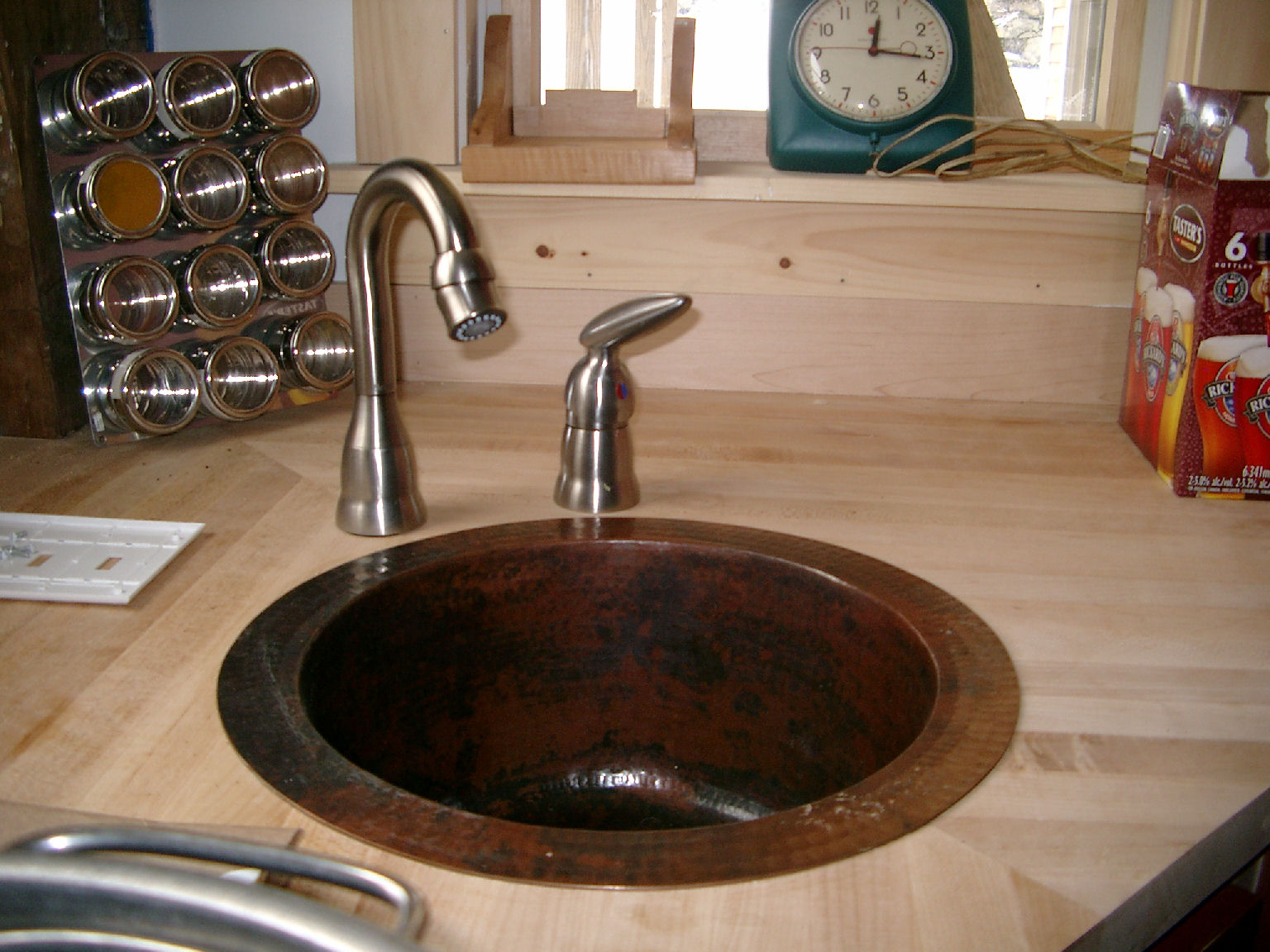 a sink with the faucet running at the top