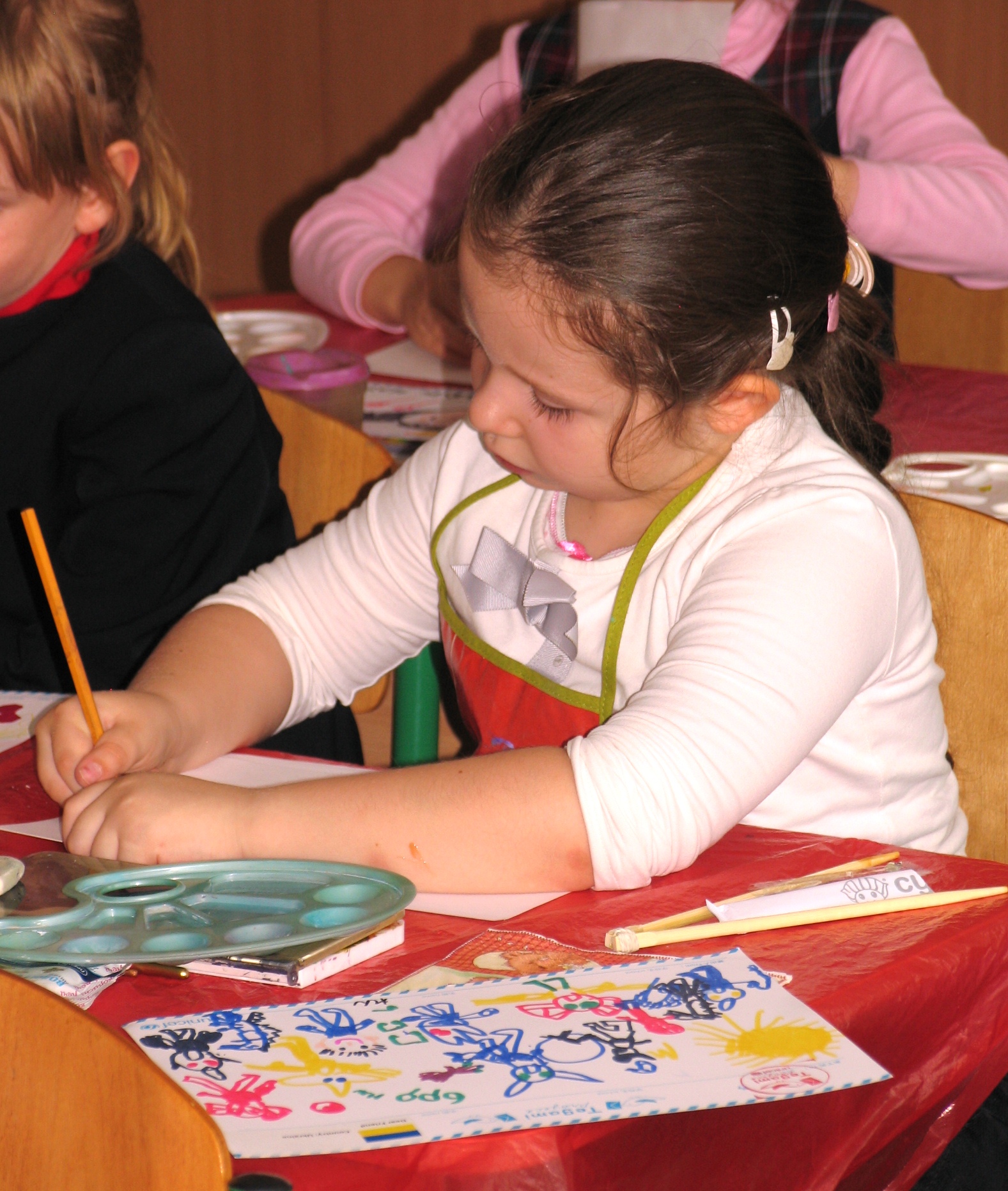 the child has to write and wipe on the umbrella