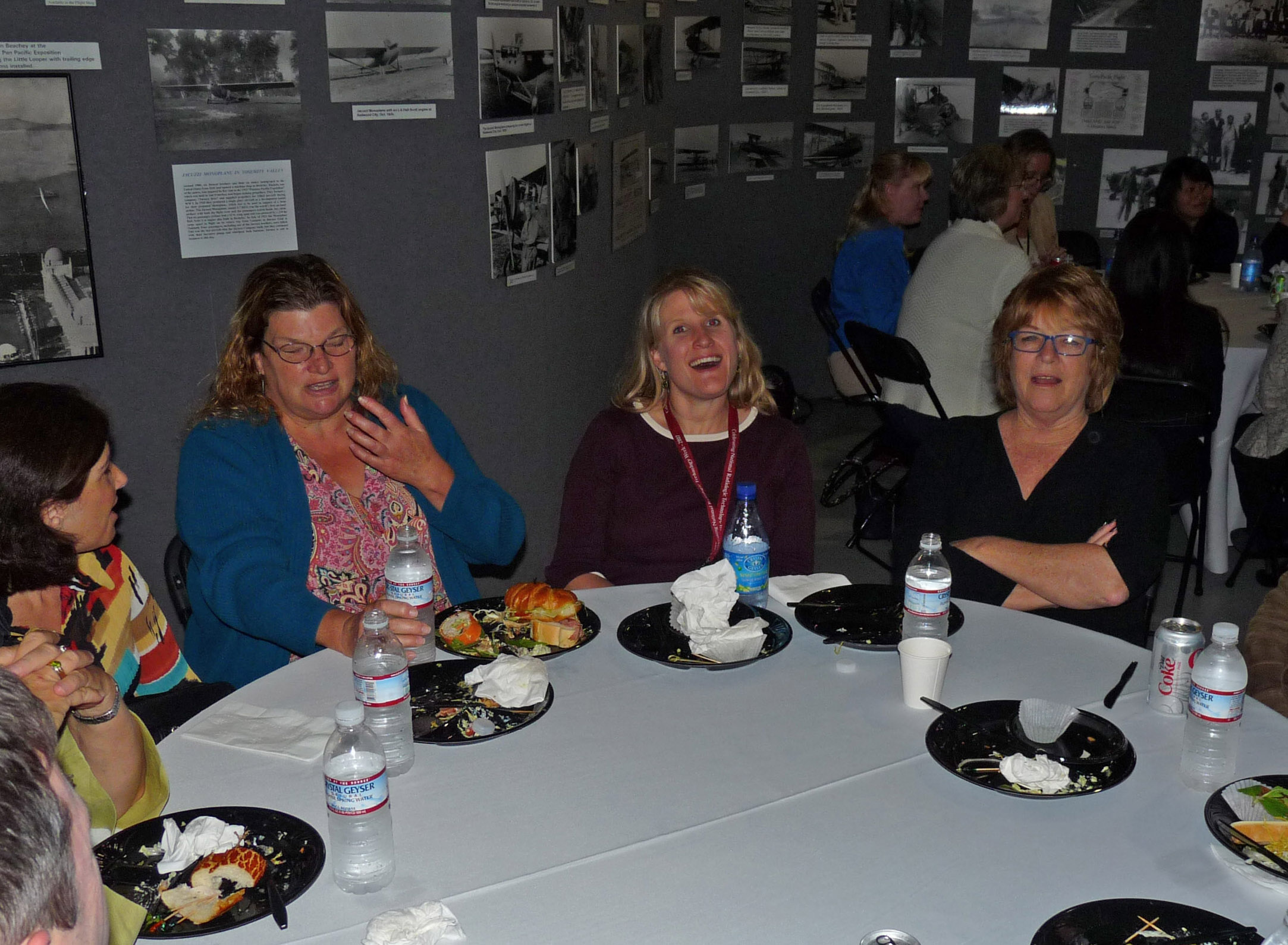 a group of women sitting around a table