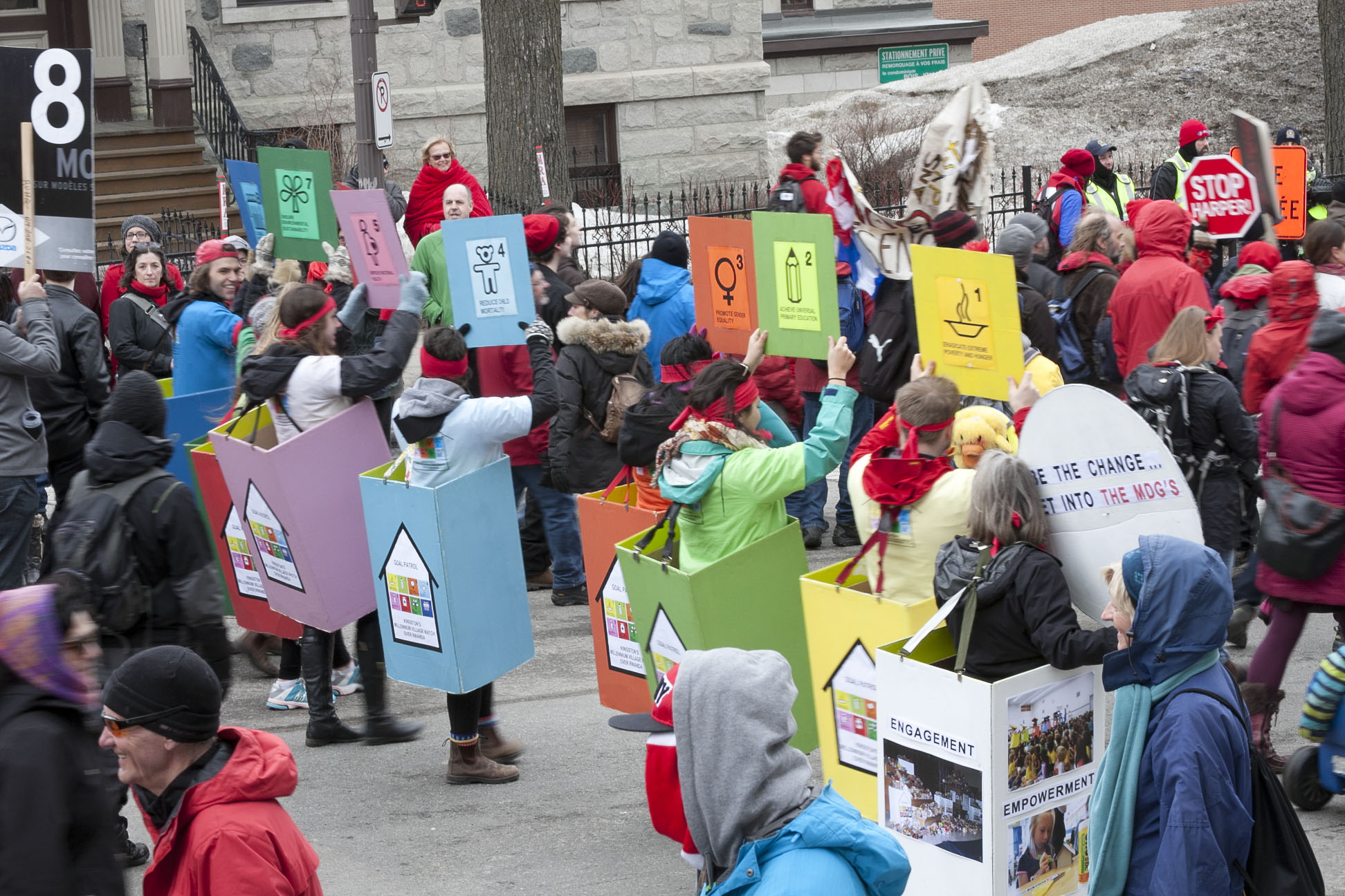 a group of people in costume holding up signs