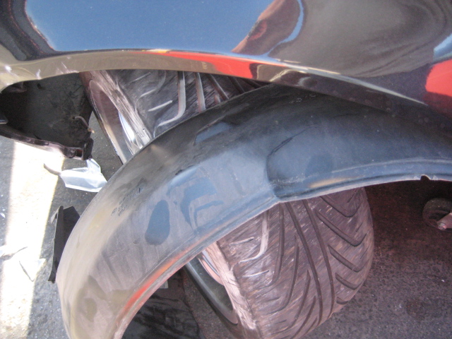 an image of close up view of tire damage