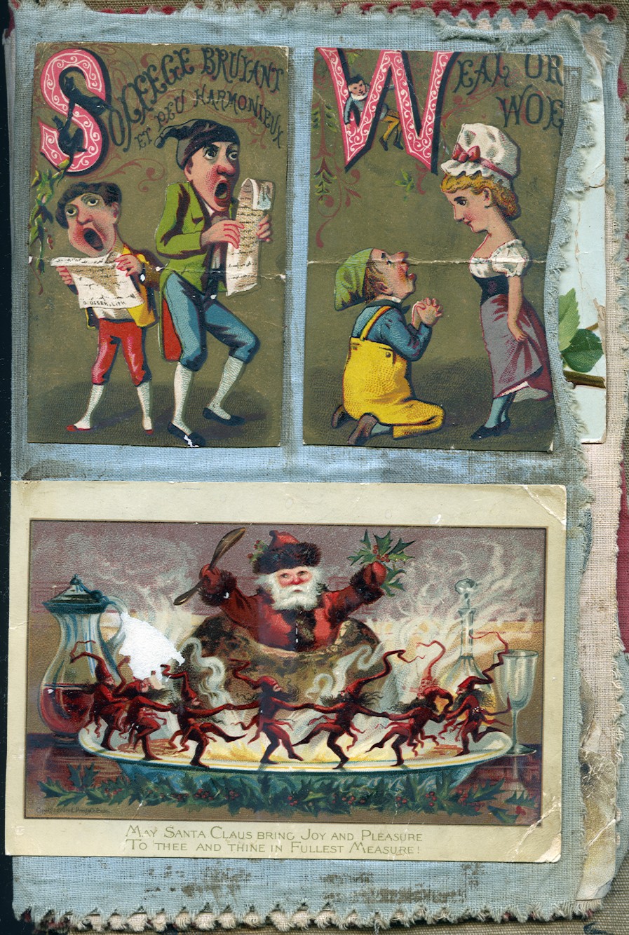 two children with santa and reindeer on sleigh