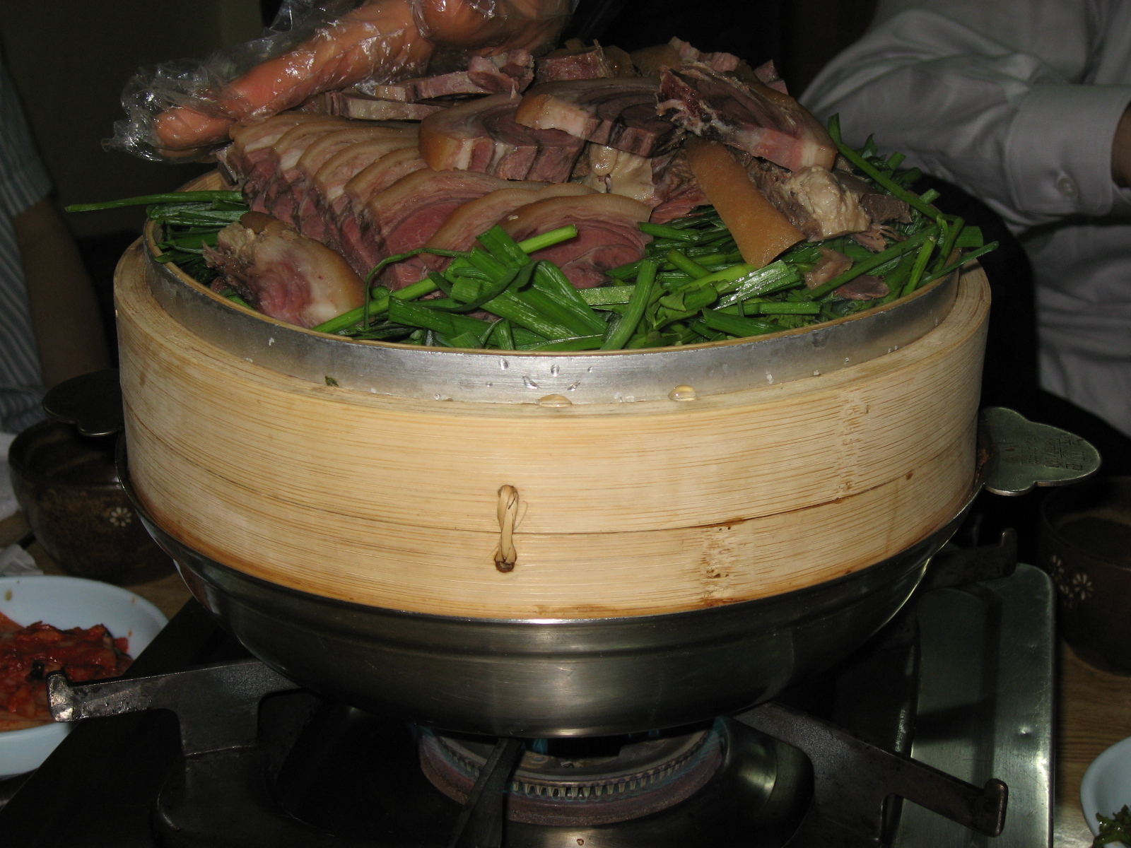there is a pot with some meat on it