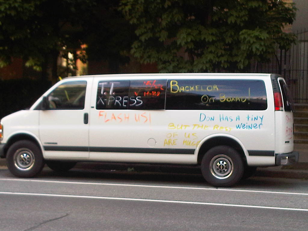 a van has writing on it to say it is not easy