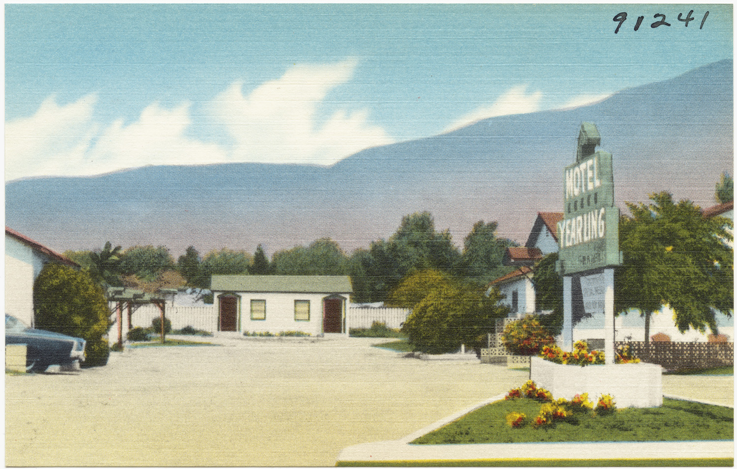 the old postcard shows an image of a town