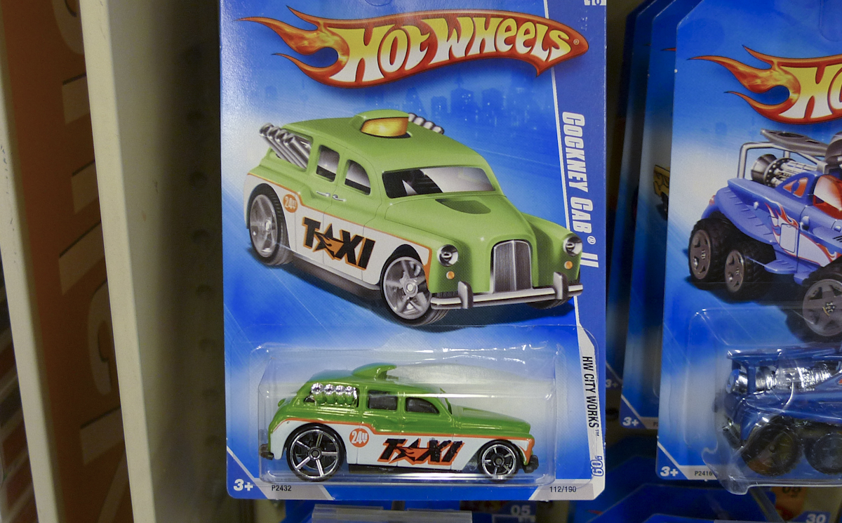 a pair of  wheels diecast toys are for sale