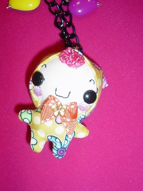 a stuffed animal hanging from a key chain