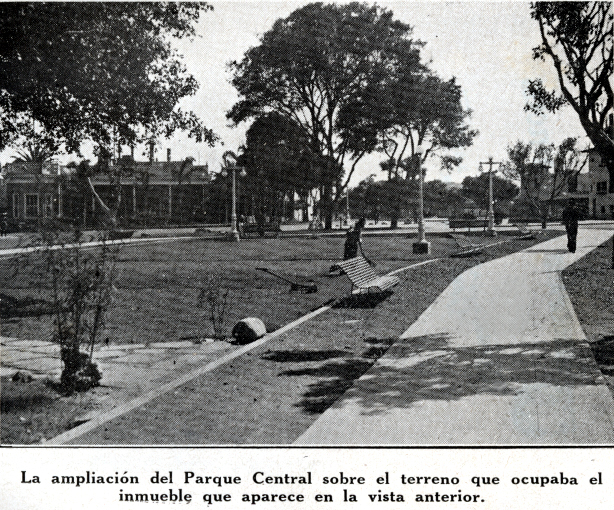 an old pograph of a person laying on a park path