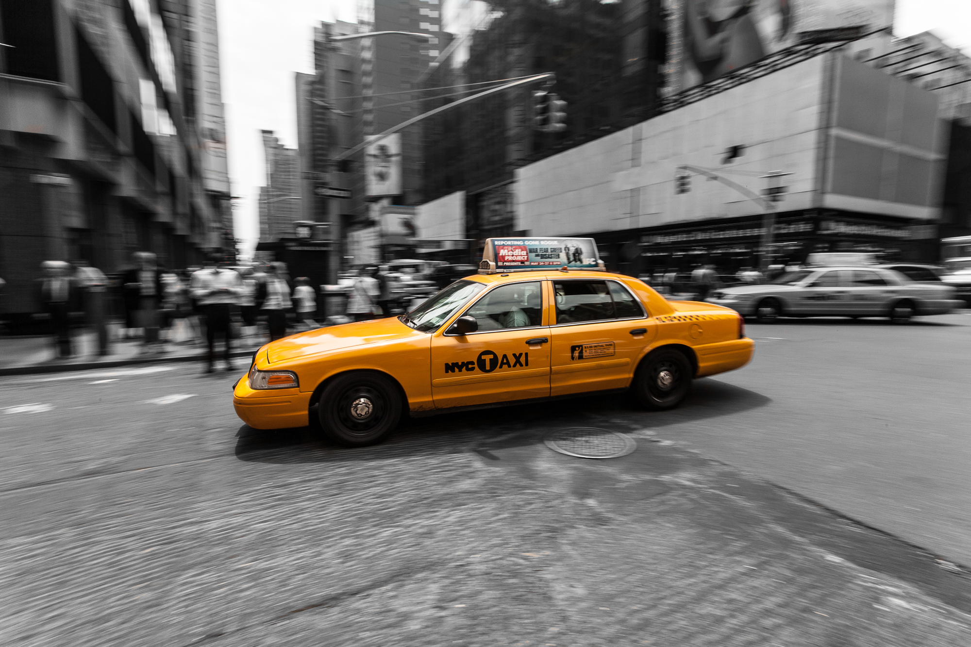 a yellow taxi cab with a sign on the front
