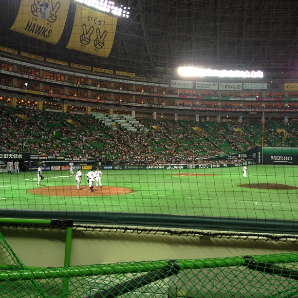 a baseball field with many players on it