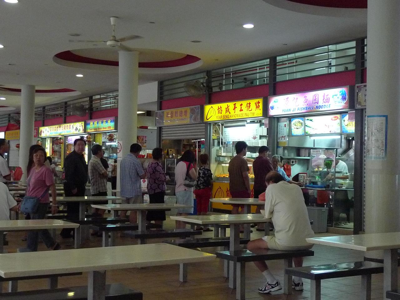 there are a lot of people at this food court