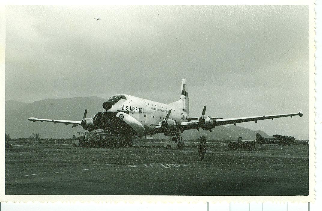 the large plane is parked on the runway