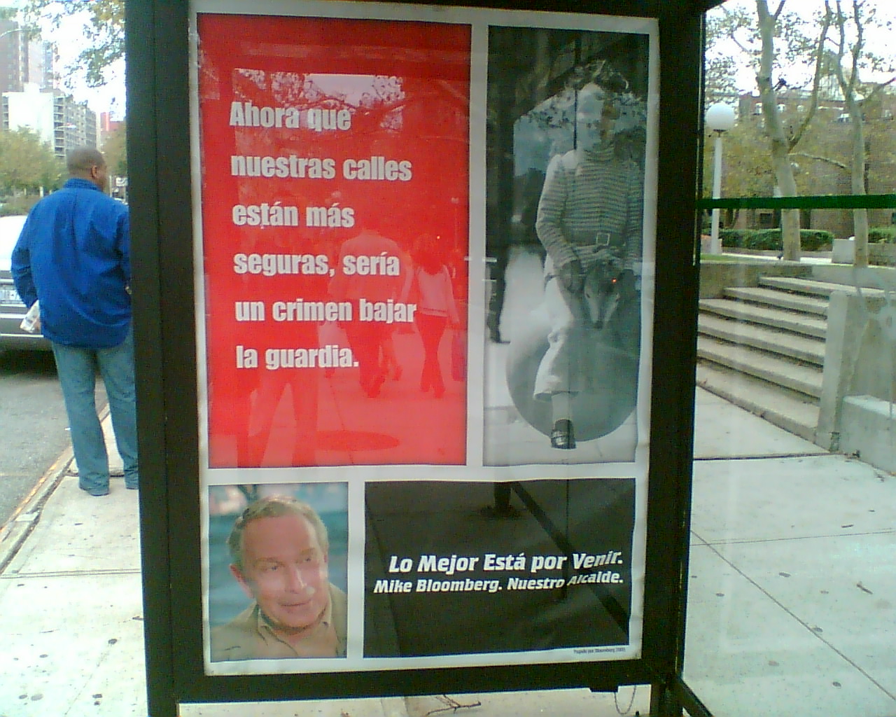 a sign that is next to a sidewalk